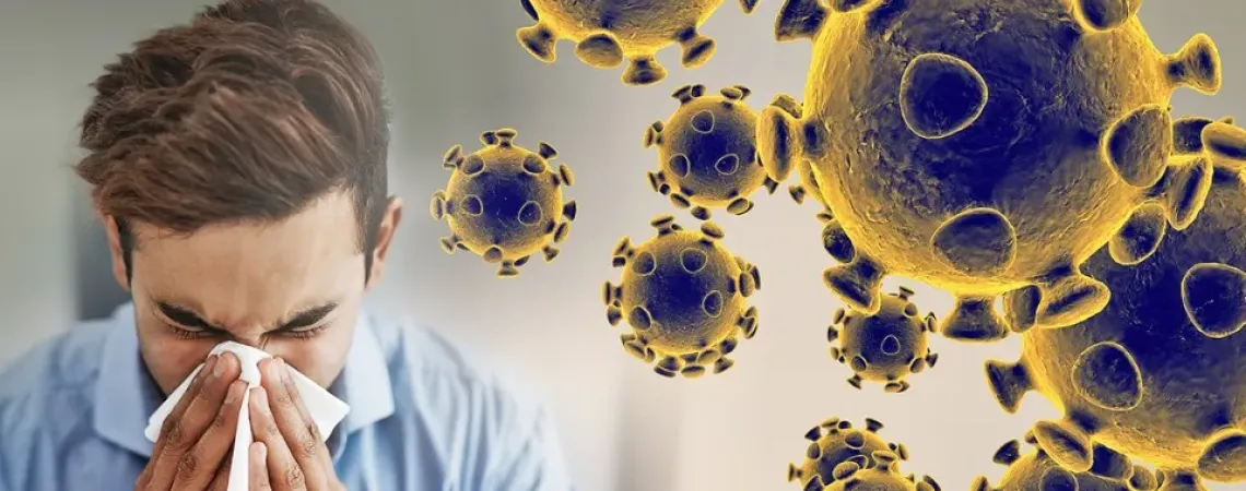 homme qui se mouche à côté du coronavirus
