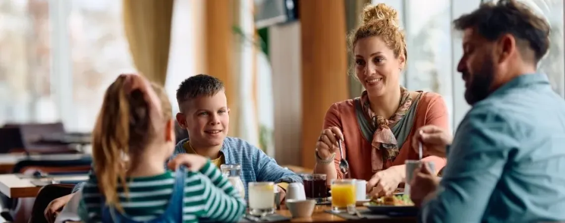 Family enjoying a nutritious meal at a top healthy restaurant in Toronto recommended by a nutritionist and registered dietitian