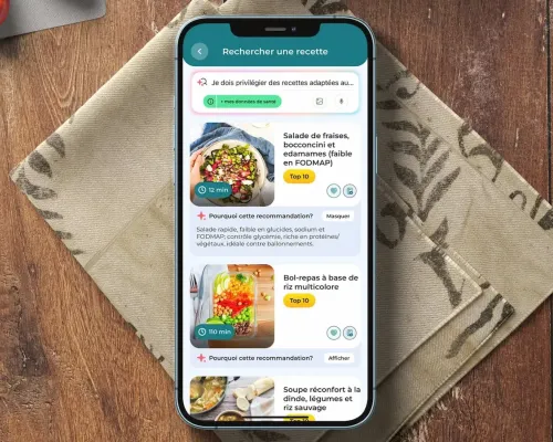 application koalapro fonction recherche de recette intelligente, sur un fond en bois avec décorations