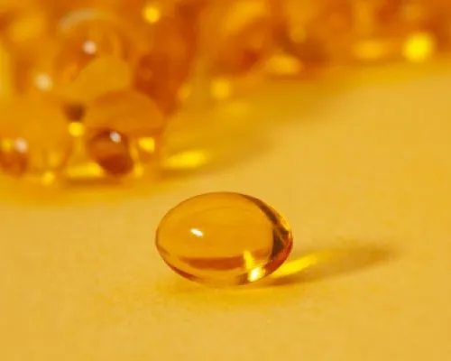 Vitamine sur fond jaune